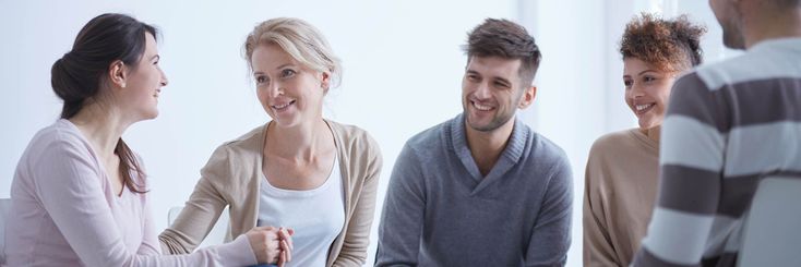 Supportive family discusses addiction treatment at a meeting in Savannah, GA.
