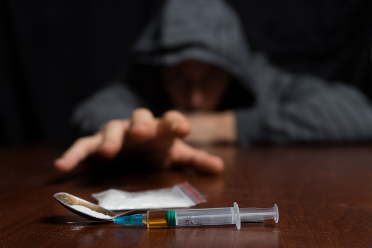 A person suffering from withdrawal symptoms from Substance abuse in Savannah, GA.